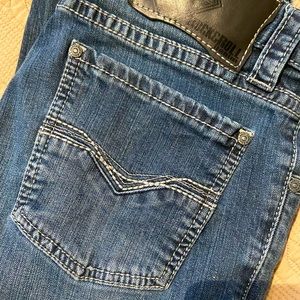 Mens slim straight leg jeans . Rock and roll denim brand  size 30-32.